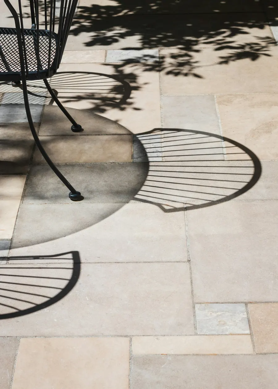 Large-format pavers with dappled shade and clean joints